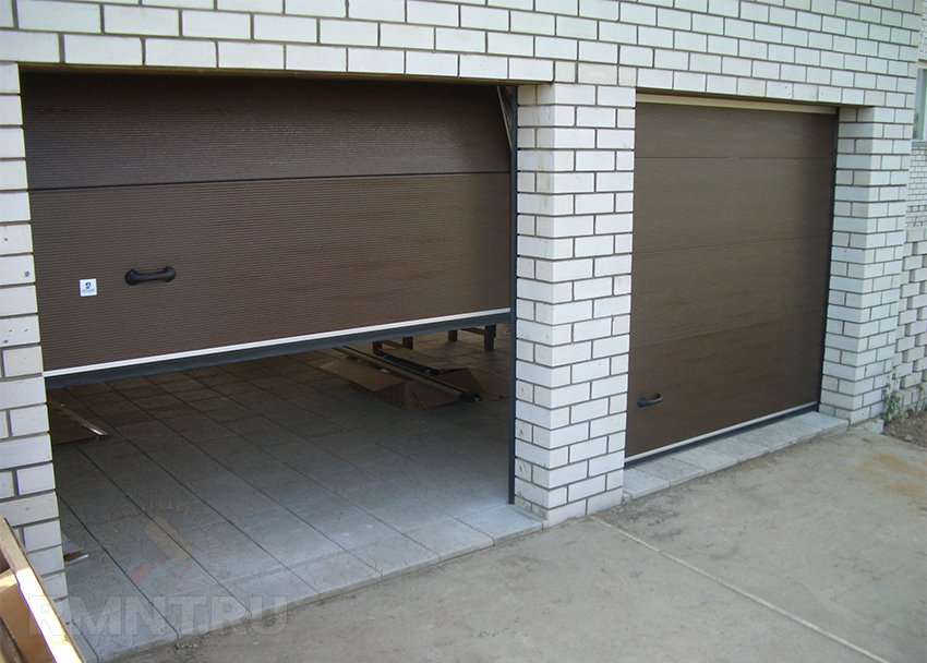 Секційні ворота для гаража: монтаж своїми руками
